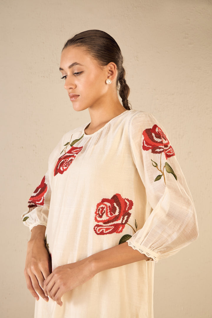 ROYAL ROSE: IVORY CHANDERI RED EMBROIDERY ROSE KURTA WITH IVORY PINTUCK PANTS