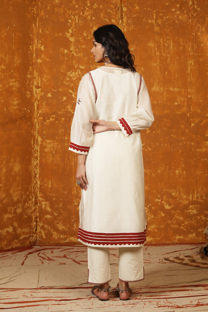 Ivory Triangle Appliuqe Work Kurta With Pants & Dupatta