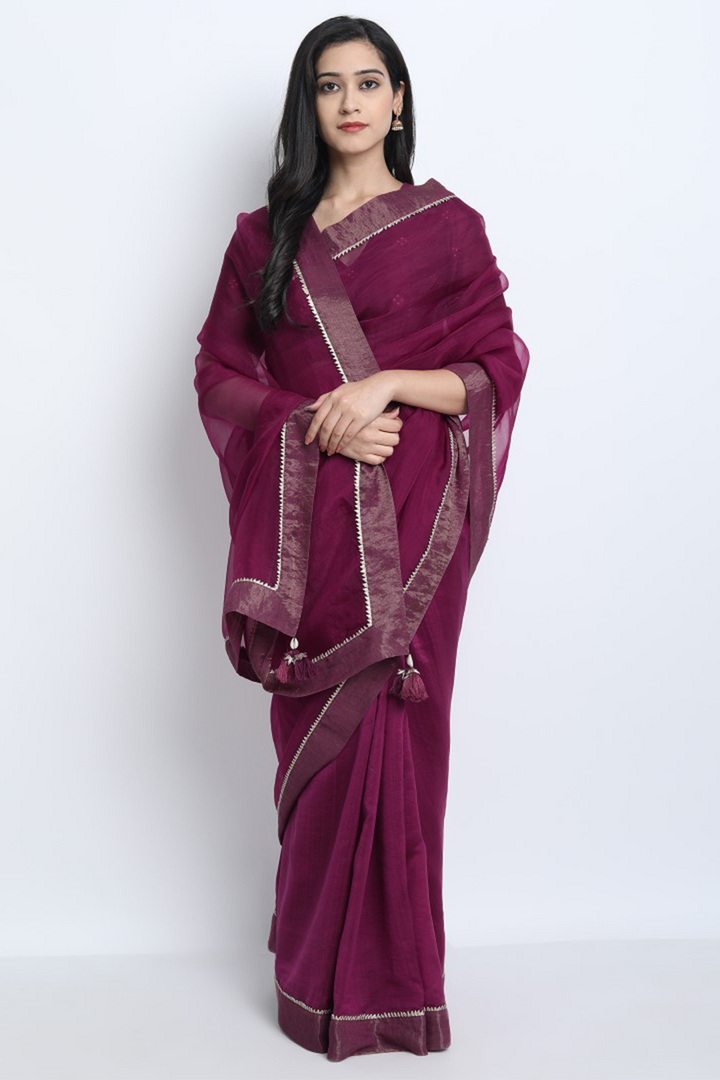 WINE CHANDERI WITH GOTA DETAILING JAIMINI SAREE WITH WINE CHANDERI BANDHANI BLOUSE