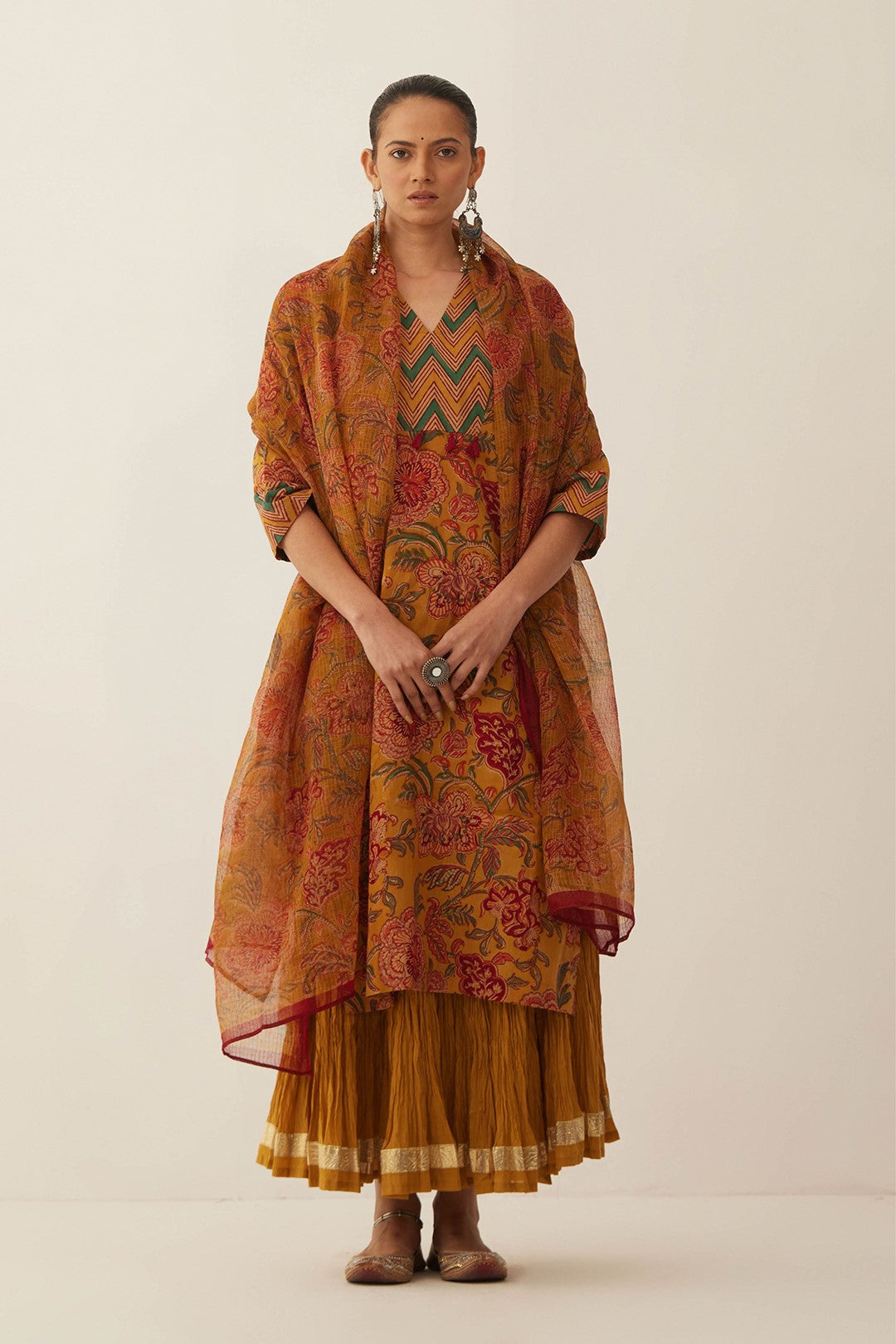 BURNT ORANGE FLORAL CHINTZ COTTON KURTA WITH GHAGRA AND FLORAL DUPATTA