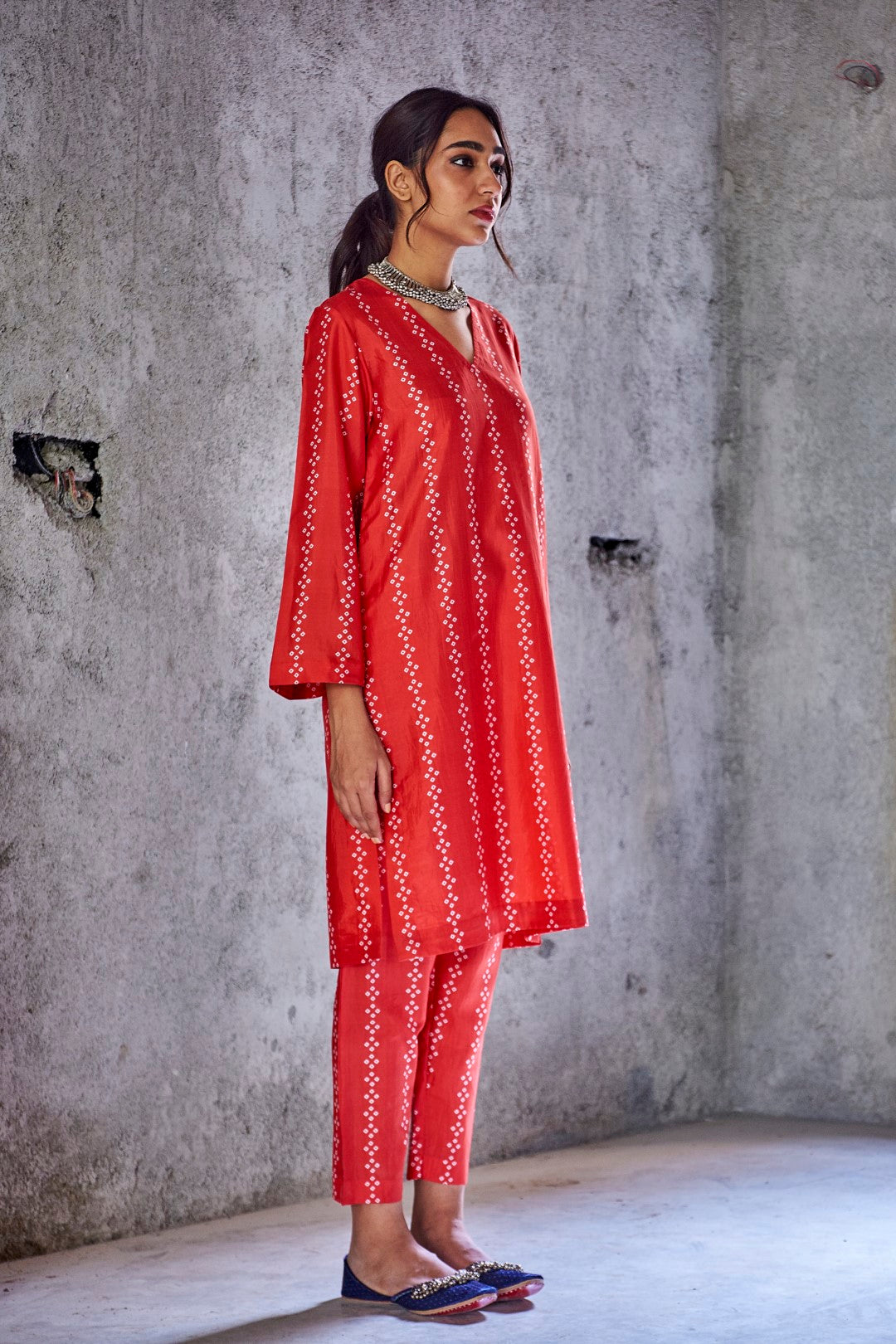 RED NATURAL SILK VERTICAL STRIPE BANDHANI PRINT KURTA AND PANT WITH GOLD FRINGE GOTA DUPATTA