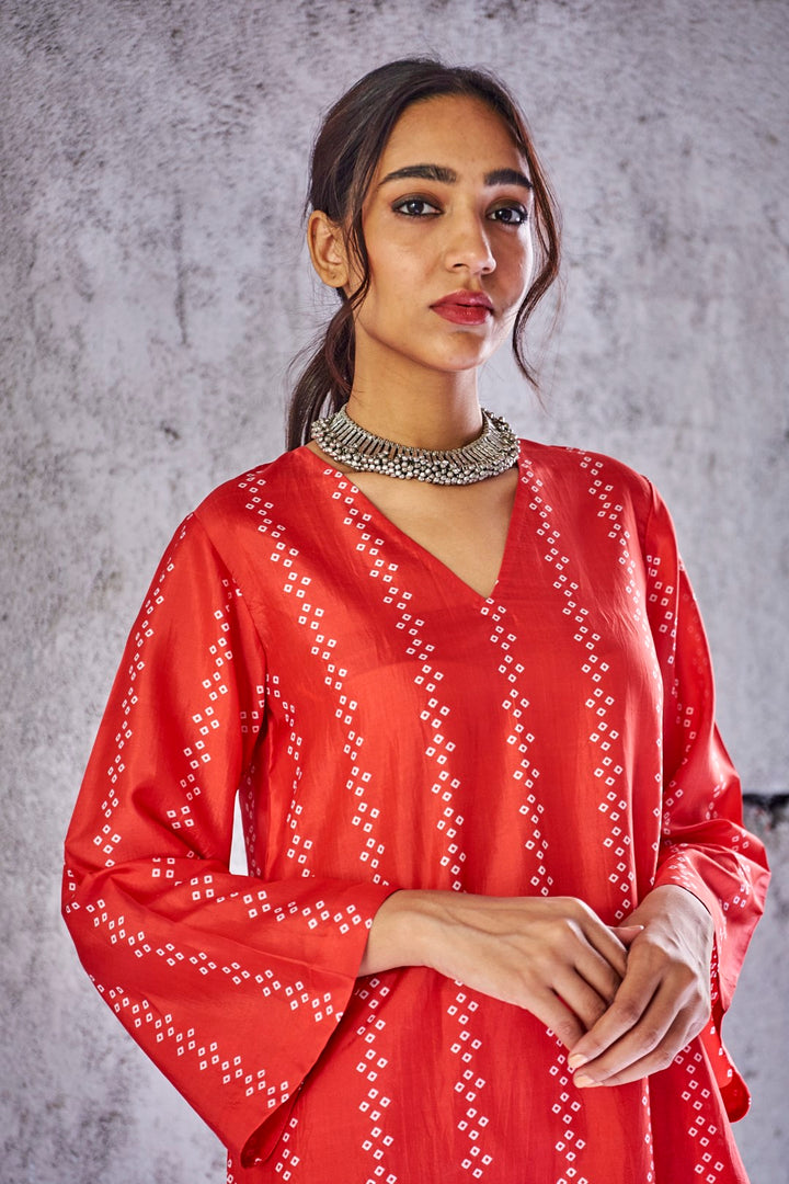 RED NATURAL SILK VERTICAL STRIPE BANDHANI PRINT KURTA AND PANT WITH GOLD FRINGE GOTA DUPATTA