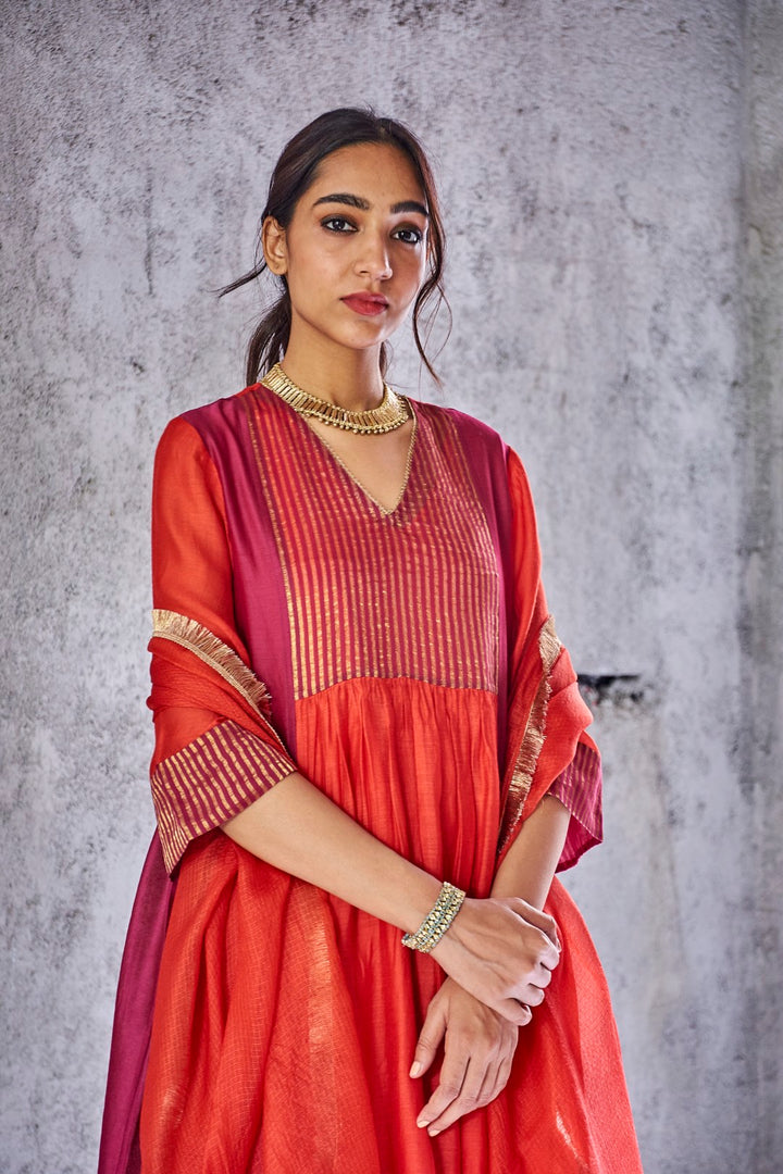 RED SILK CHANDERI ZARI STRIPE UMA KURTA WITH PANT AND GOLD FRINGE GOTA BORDER DUPATTA