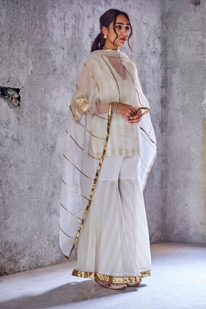 IVORY HANDWOVEN ZARI STRIPE CHANDERI MEERA KURTA WITH GHARARA AND DUPATTA