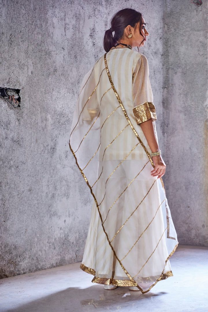 IVORY HANDWOVEN ZARI STRIPE CHANDERI MEERA KURTA WITH GHARARA AND DUPATTA